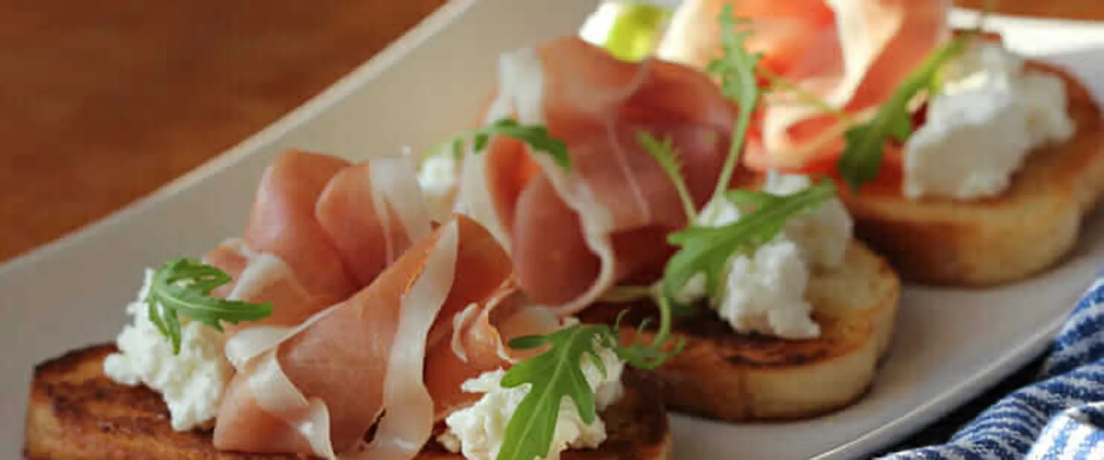 Bruschetta with Prosciutto, Arugula and Burrata