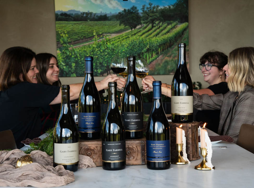 4 women toasting with Gary Farrell Bottles